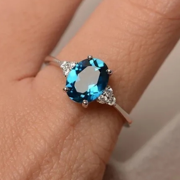 1/2 CT. TW. SWISS BLUE  ZIRCON AND LAB-CREATED DIAMOND RING IN S925 - Picture 2 of 3